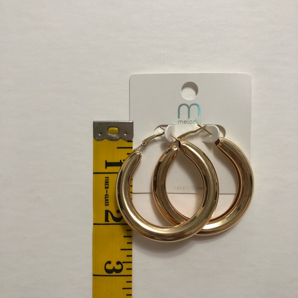 Gold large thick hoop earrings - Picture 6 of 7